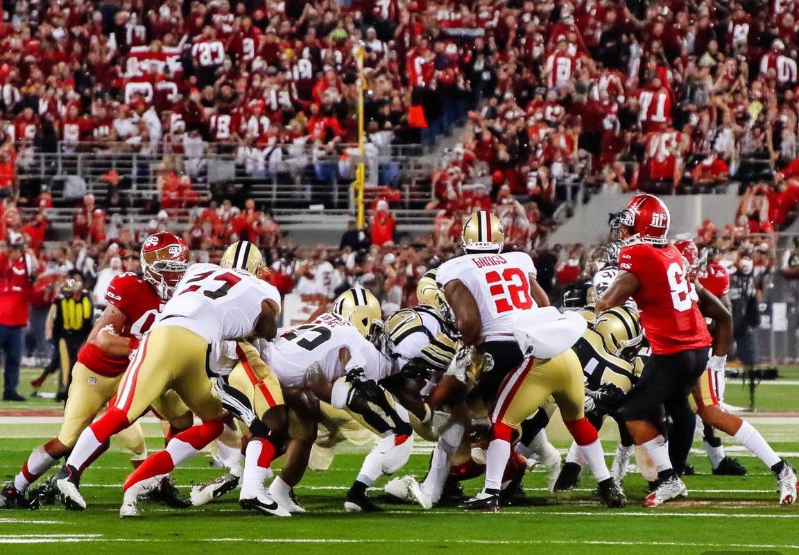 NFL激情对决：49人队与圣徒队巅峰之战回顾(图2)